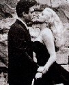 Marcello Mastroianni e Anita Ekberg in "La dolce vita", capolavoro senza padroni il copyright  un pasticcio mondiale