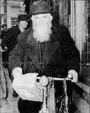 Padre Giuseppe Olinto Marella in bicicletta ritratto da Walter Breveglieri
