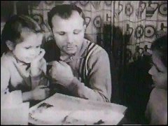 Yury at home with his daughters